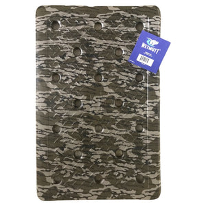 Dog with paws on a mossy oak kennel mat